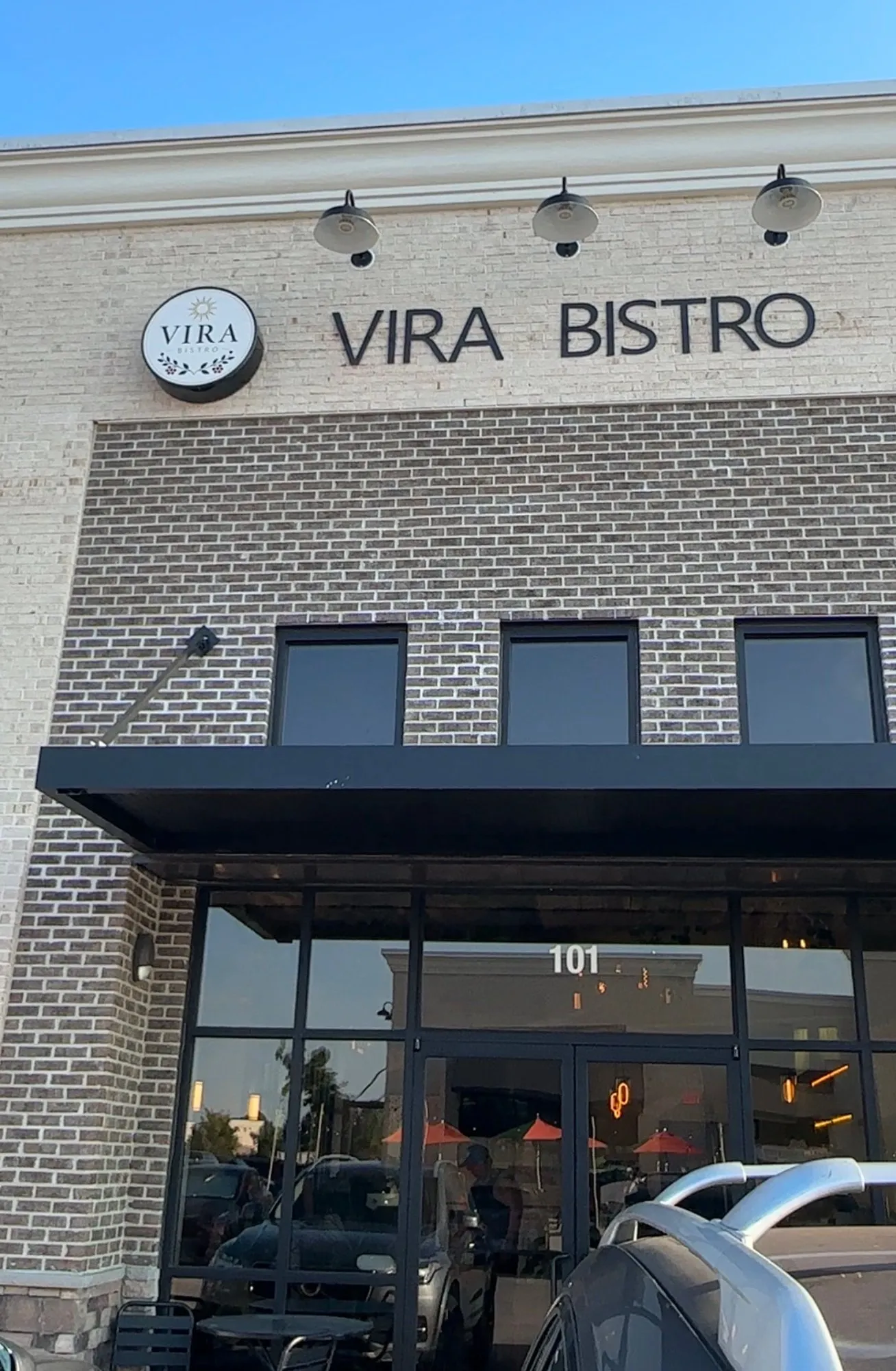 The Vira Bistro sign above suite 101 on Rogers Branch Road